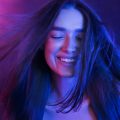 woman-colorful-portrait-girl-playing-with-hair-2025-03-18-19-17-43-utc_11zon.jpg