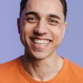 young-brunette-white-man-smiling-and-looking-at-ca-2025-02-16-01-13-35-utc.jpg